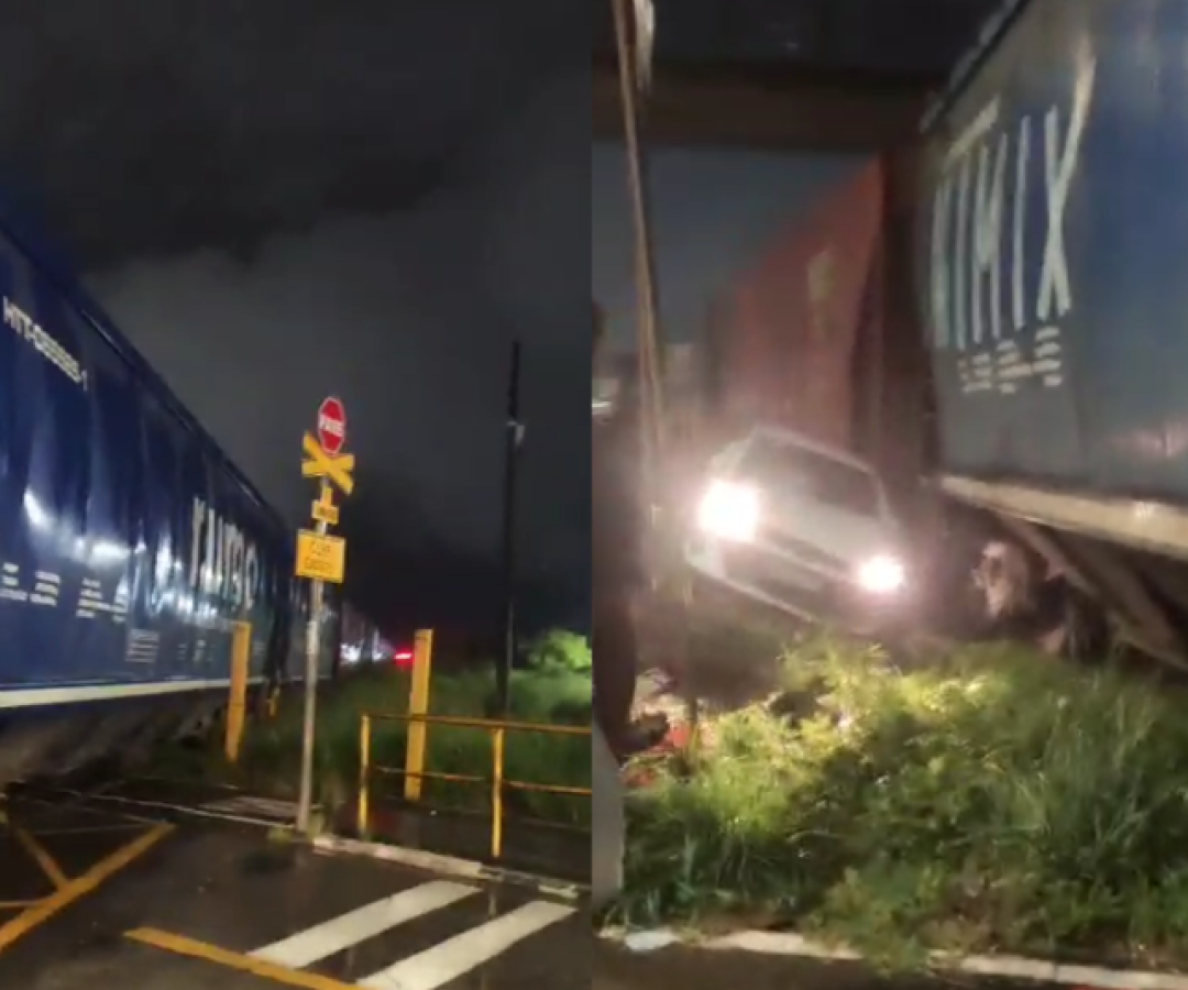 Um carro foi atingido por um trem de cargas na noite deste domingo (23), em Vicente de Carvalho, distrito de Guarujá (SP).