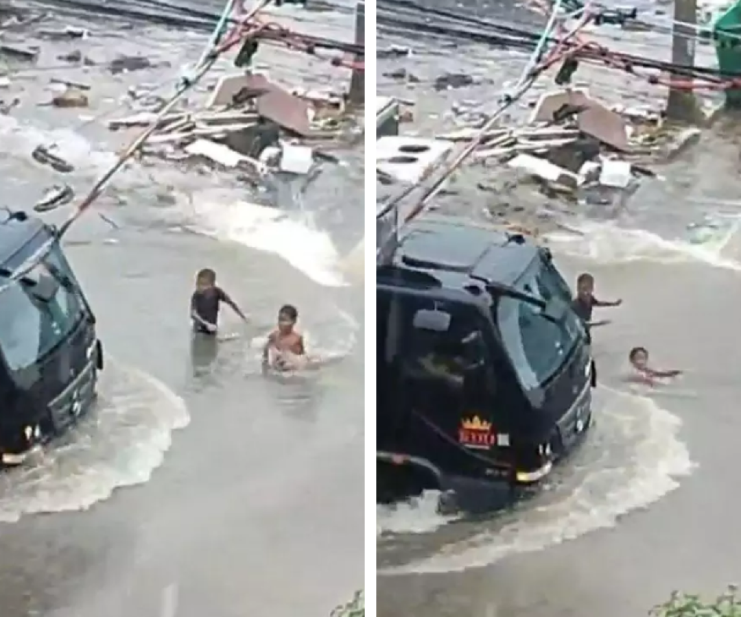 Crianças quase são atingidas por caminhão durante enchente em Guarujá